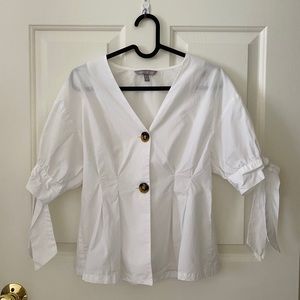 A Cute White V-neck shirt from Urban Revivo